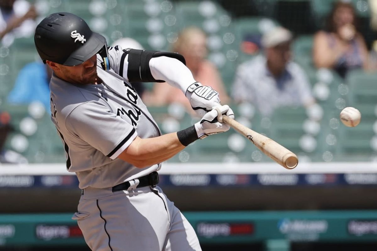 Jun 15, 2022; Detroit, Michigan, USA; Chicago White Sox second baseman Danny Mendick (20) hits a home run in the fourth inning against the Detroit Tigers at Comerica Park.