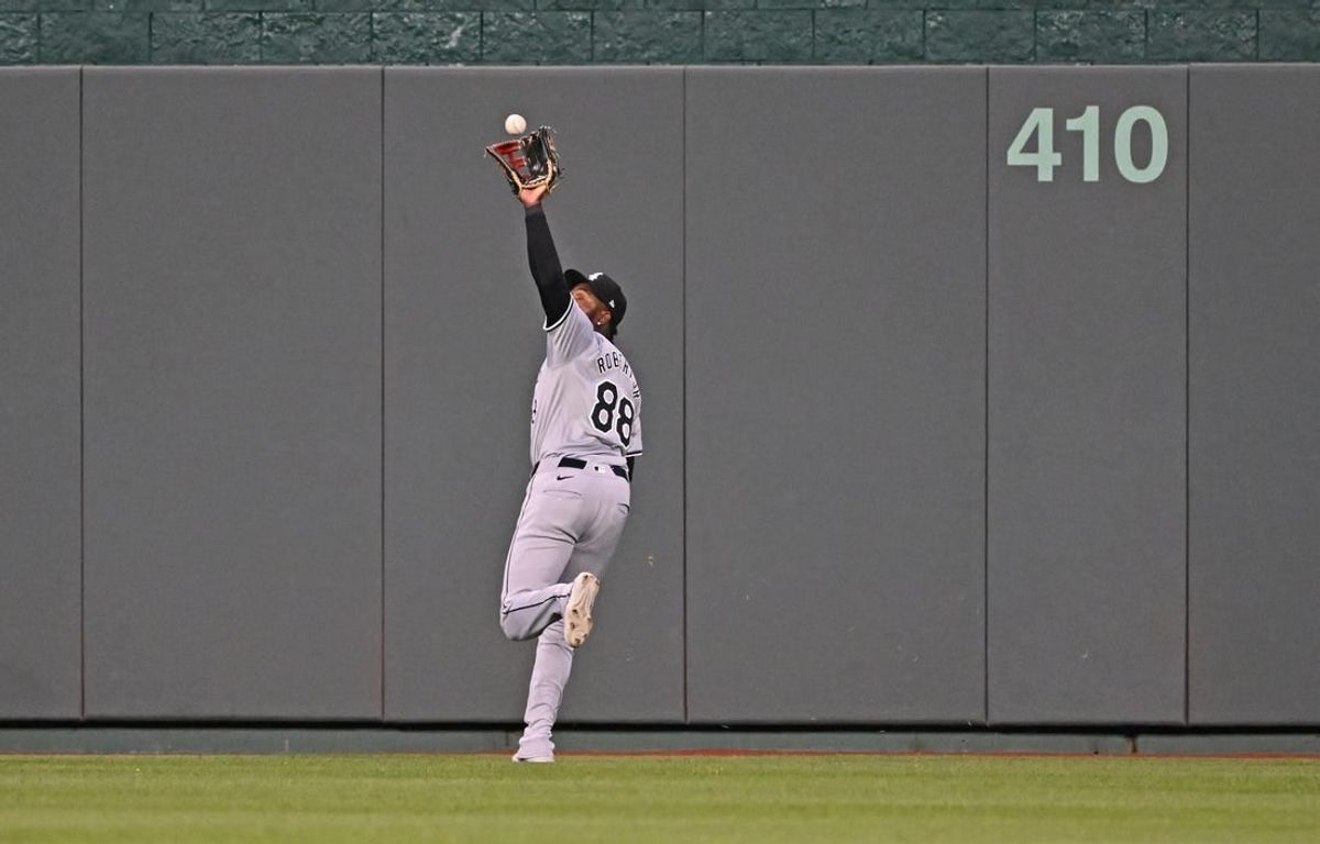 Apr 5, 2024; Kansas City, Missouri, USA; Chicago White Sox center fielder Luis Robert Jr. (88) makes a running catch on a fly ball hit by Kansas City Royals Bobby Witt Jr. (not pictured) in the fifth inning at Kauffman Stadium.