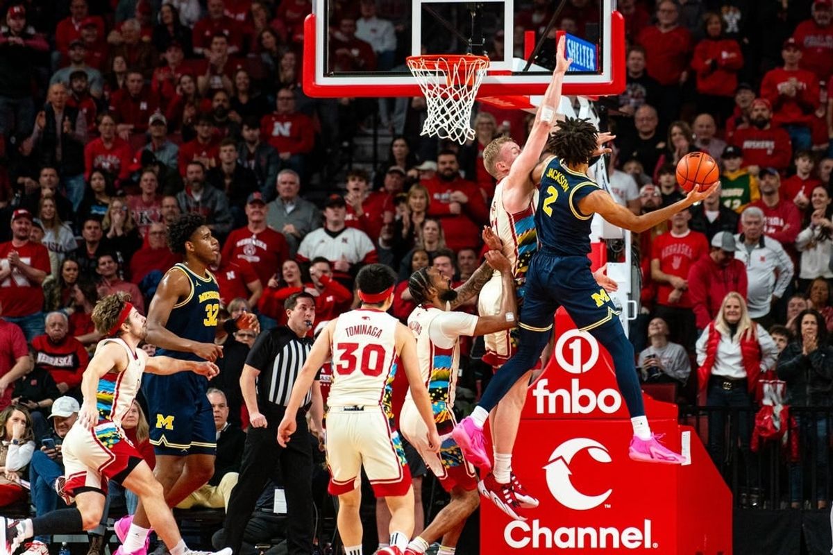 Feb 10, 2024; Lincoln, Nebraska, USA; Michigan Wolverines forward Tray Jackson (2) is blocked by Nebraska Cornhuskers forward Rienk Mast (51) during the first half at Pinnacle Bank Arena.
