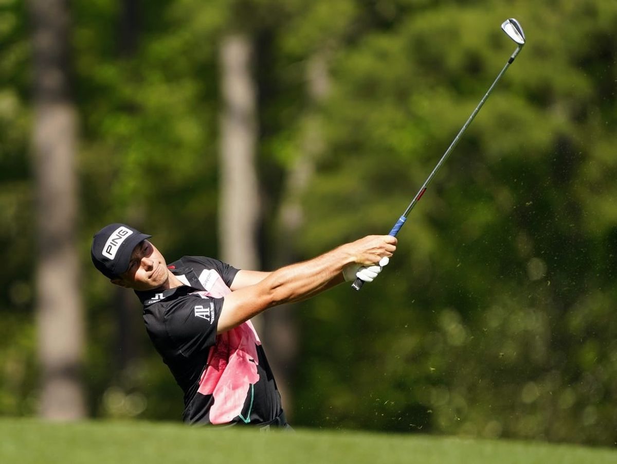 Apr 11, 2024; Augusta, Georgia, USA; Viktor Hovland tees off on No. 12 during the first round of the Masters Tournament.