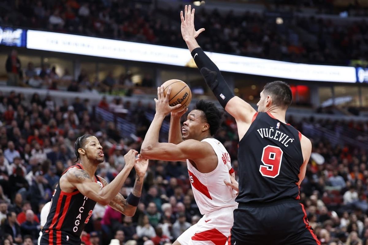 Jan 30, 2024; Chicago, Illinois, USA; Toronto Raptors forward Scottie Barnes (4) drives to the basket against the Chicago Bulls during the first half at United Center.
