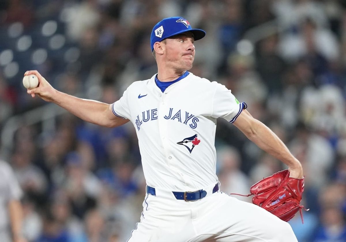 Apr 15, 2024; Toronto, Ontario, CAN; Toronto Blue Jays pitcher Chris Bassitt wearing number 42 for Jackie Robinson Day throws a pitch against the New York Yankees during the first inning at Rogers Centre.