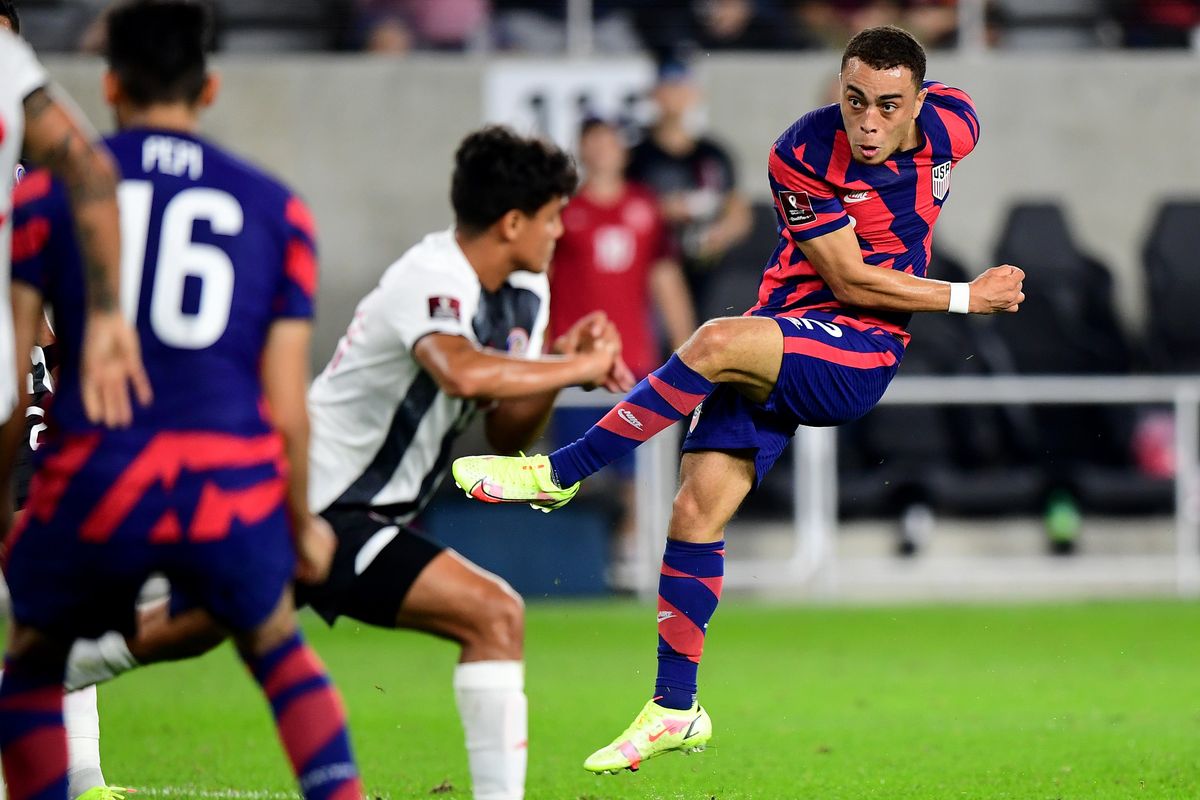 Sergiño Dest shoots and scores a goal against Costa Rica.
