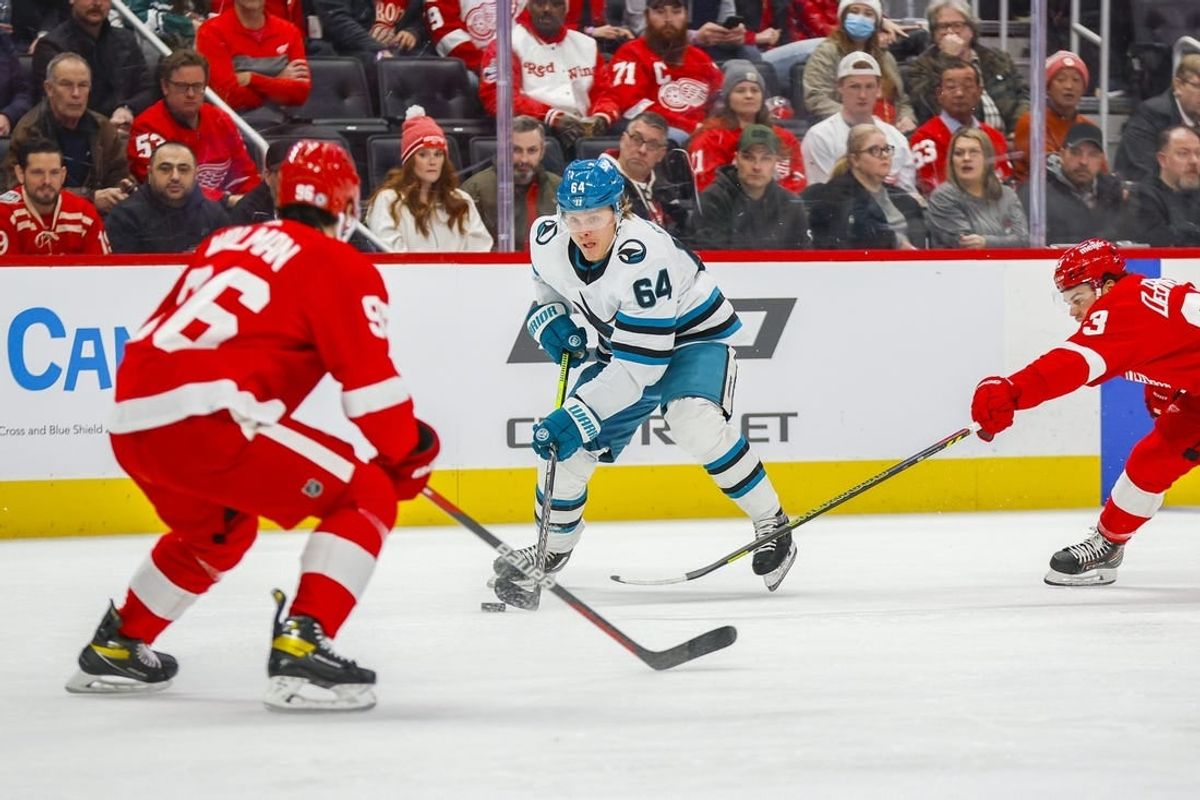 Dec 7, 2023; Detroit, Michigan, USA; San Jose Sharks center Mikael Granlund (64) handles the puck during the first period at Little Caesars Arena.
