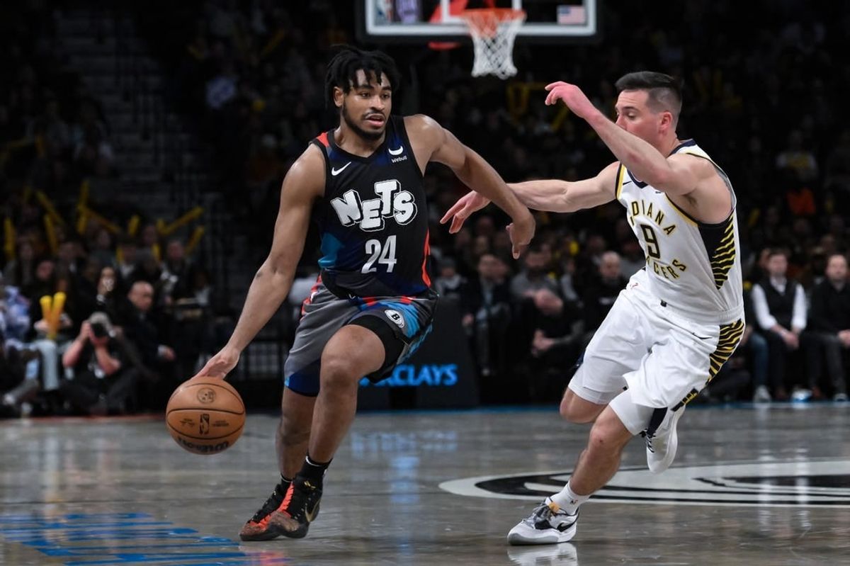 Apr 3, 2024; Brooklyn, New York, USA; Brooklyn Nets guard Cam Thomas (24) drives to the basket while being defended by Indiana Pacers guard T.J. McConnell (9) during the third quarter at Barclays Center.