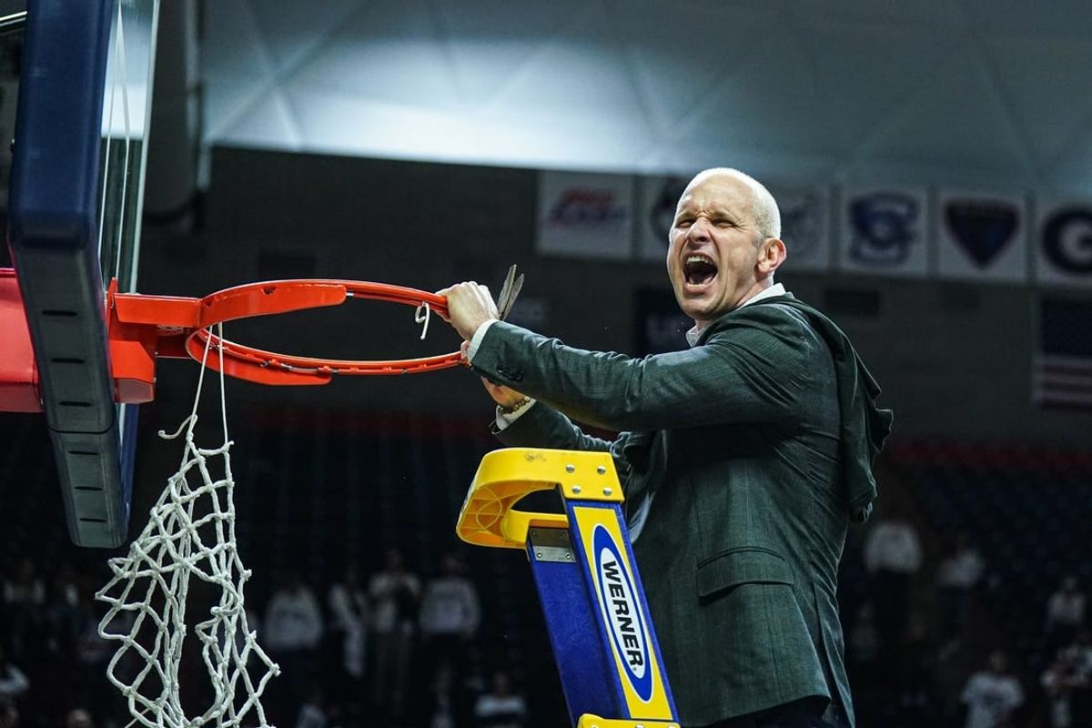 Mar 3, 2024; Storrs, Connecticut, USA; UConn Huskies head coach Dan Hurley cuts down the net as the team celebrates are named Big East Regular Season Champions after the game against the Seton Hall Pirates at Harry A. Gampel Pavilion.