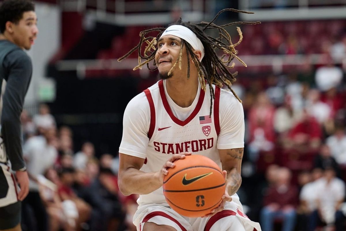 Jan 18, 2024; Stanford, California, USA; Stanford Cardinal guard Kanaan Carlyle (3) dribbles the ball against the Washington State Cougars during the first half at Maples Pavilion.