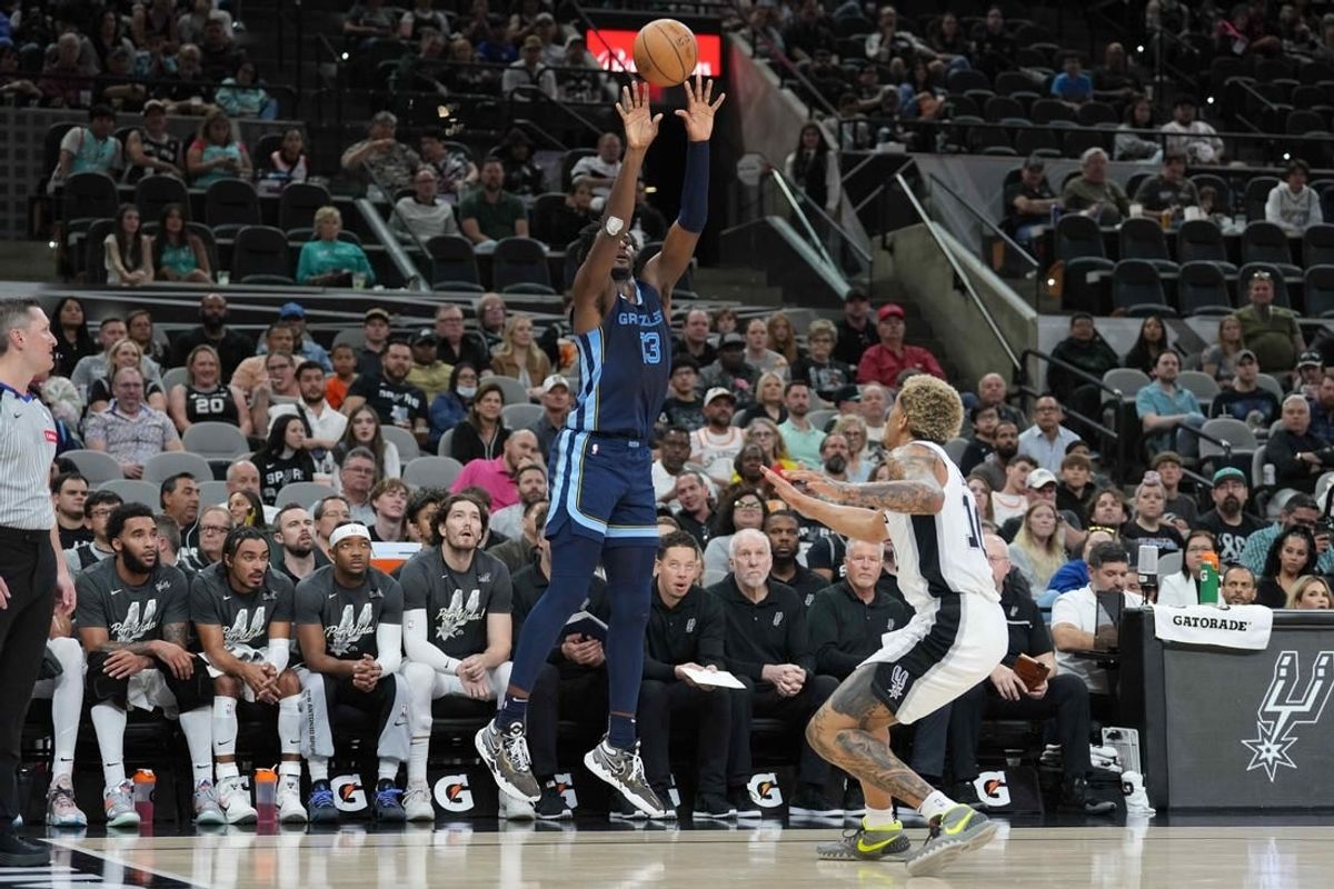 Mar 22, 2024; San Antonio, Texas, USA; Memphis Grizzlies forward Jaren Jackson Jr. (13) shoots over San Antonio Spurs forward Jeremy Sochan (10) in the first half at Frost Bank Center.