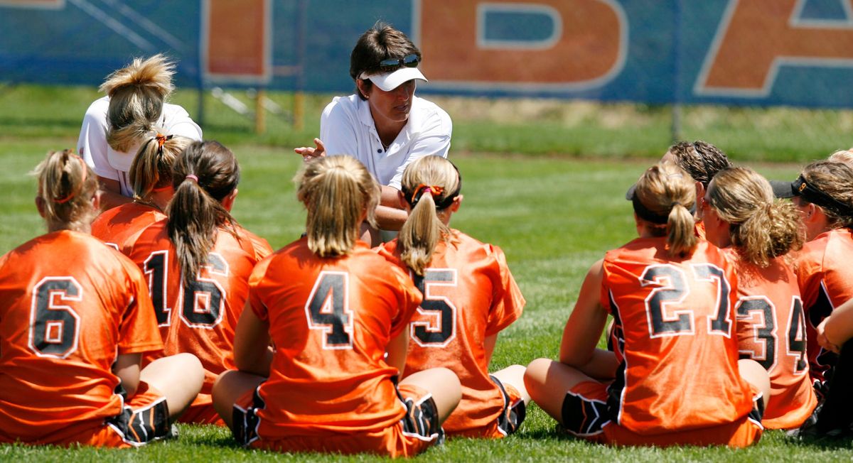 Softball girls (not me) plot against their coach