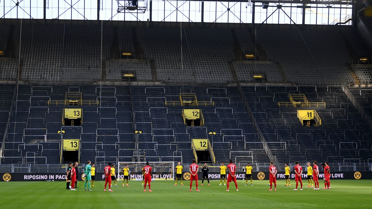 Bayern Munich edged out Borussia Dortmund, 1-0, with the clubs playing to an empty house in Germany .