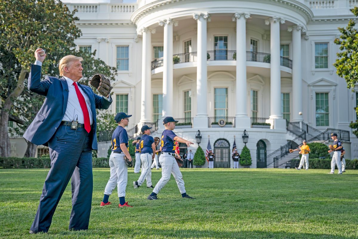 Compulsive liar Donald Trump plays catch on the White House lawn.