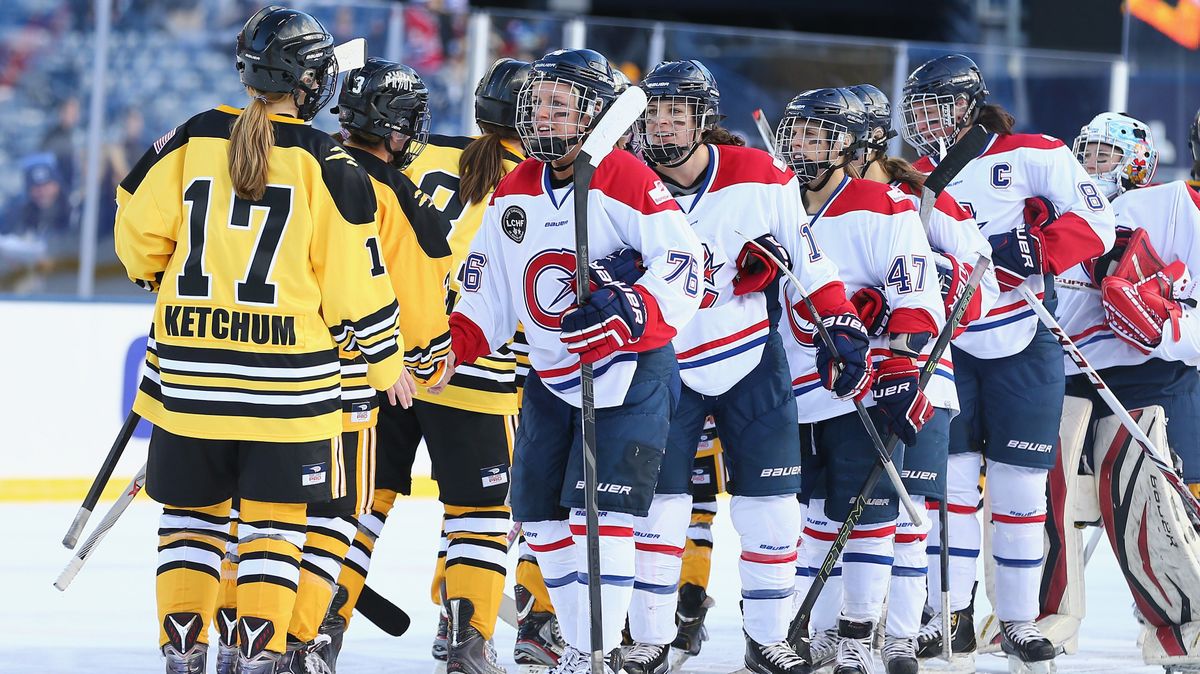Players from the Boston Pride (NWHL) and the Les Canadiennes (CWHL) shake hands following the Outdoor Womens Classic at Gillette Stadium on December 31, 2015 in Foxboro, Massachusetts.
