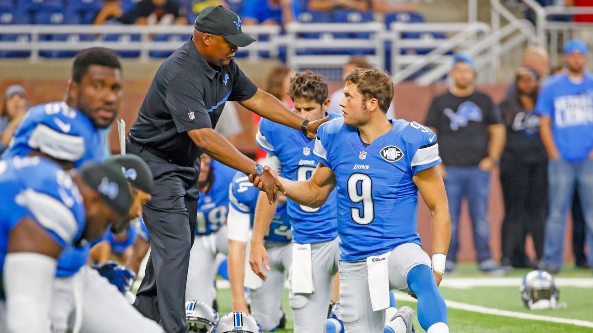 Lions QB Matthew Stafford shakes hands with head coach Jim Caldwell at Ford Field in 2016.