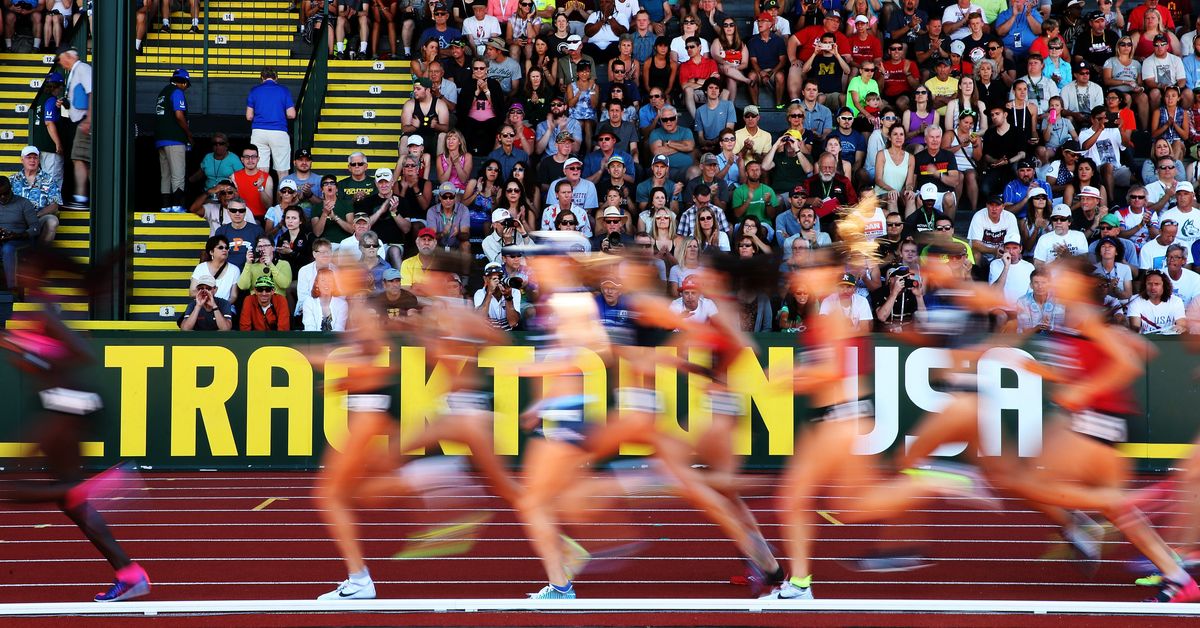 The 10,000 meters field is a blur. (Photo credit: Patrick Smith/ [object Object] )