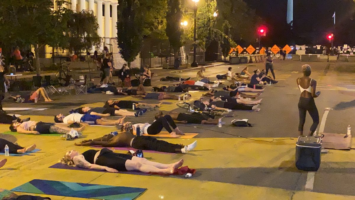 Protestors at Black Lives Matter Plaza in Washington, D.C., just steps from the White House, take part in what has become needed therapy due to the violence they’ve experienced at the hands of the D.C. police.