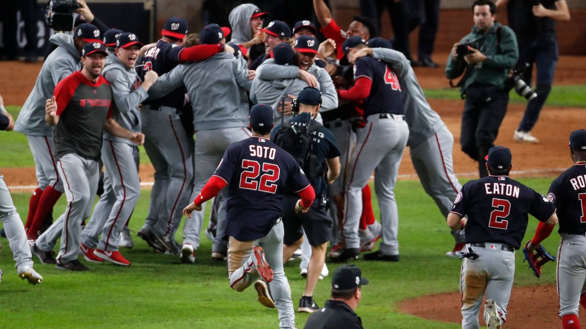 The 2019 Washington Nationals storm the mound following their World Series win.