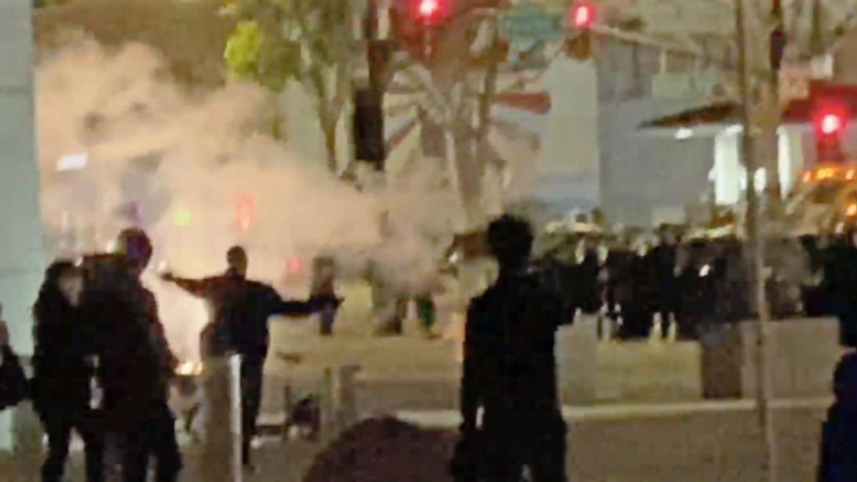Police officers instigated violent encounters with protestors in San Jose on Saturday night. Image: Mark Newshouse