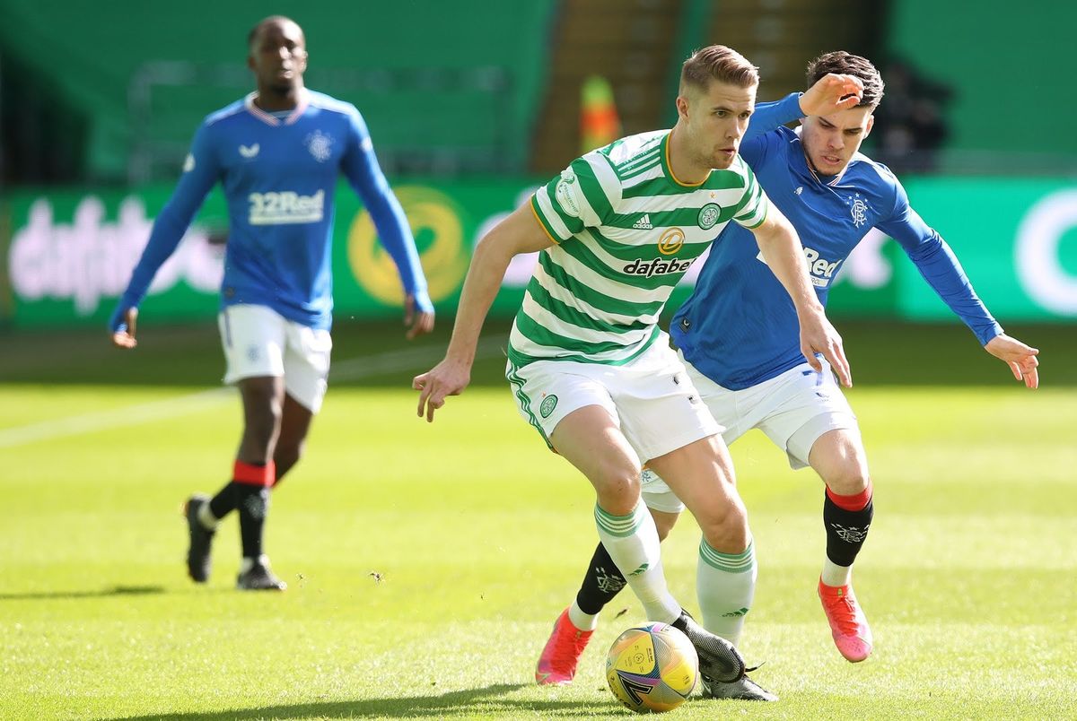 Kris Ajer of Celtic gets past Rangers’ Ianis Hagi during Sunday’s 1-1 draw.