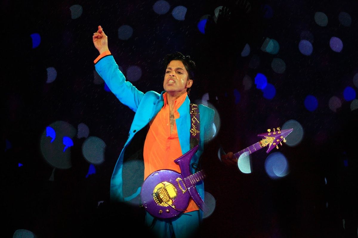 Prince performs in the pouring rain in Miami during Super Bowl XLI.
