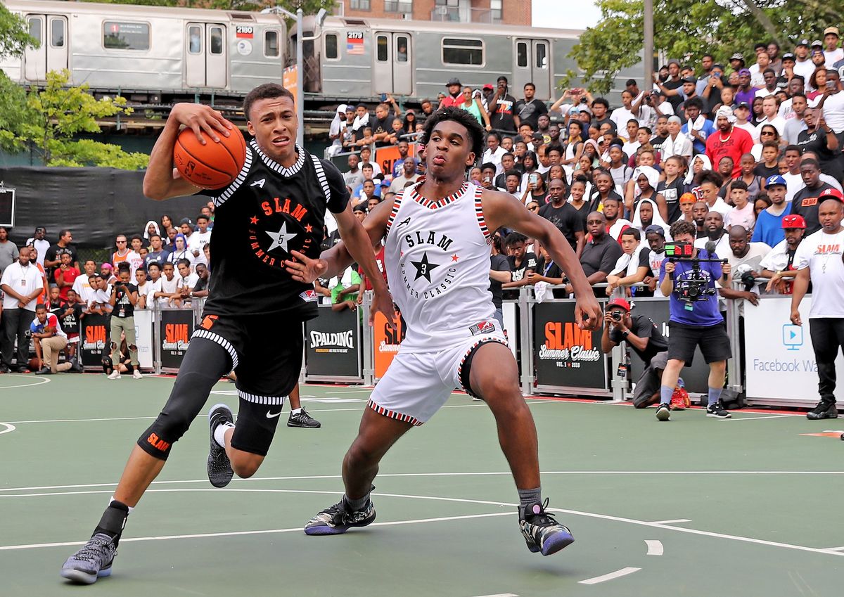 Josh Christopher(in white) hoops It up at the SLAM Summer Classic at Dyckman Park in New York City In 2018.