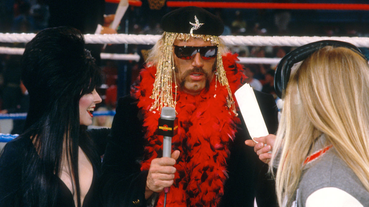 Just two  weeks after his attempt at unionizing was busted, Jesse Ventura prepares for a live shot with Elvira at WrestleMania 2.