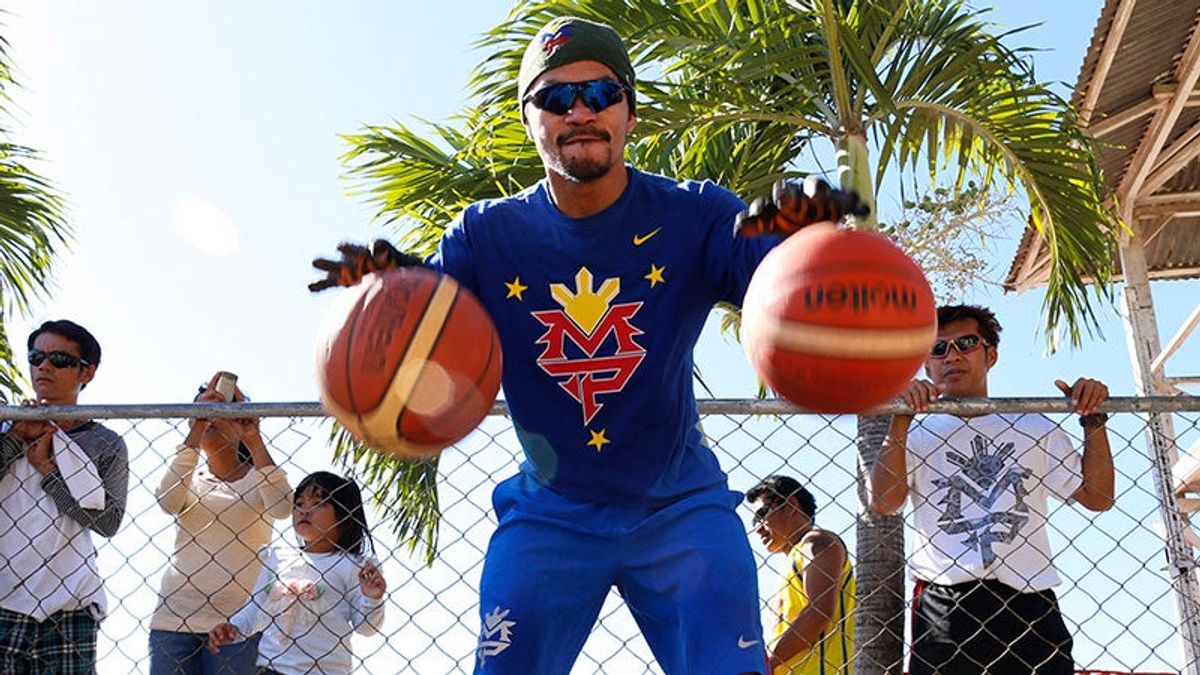 Pacquiao, playing with two balls.