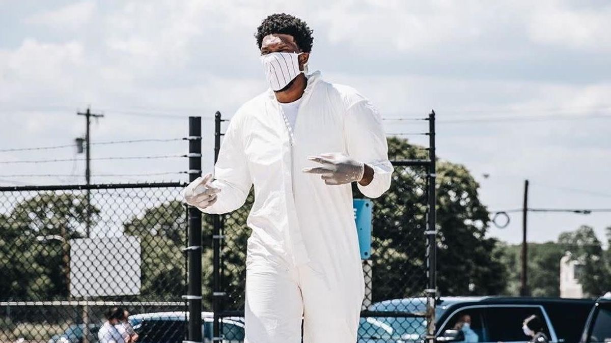 Joel Embiid wasn’t taking any chances upon his arrival in Orlando, Fla.