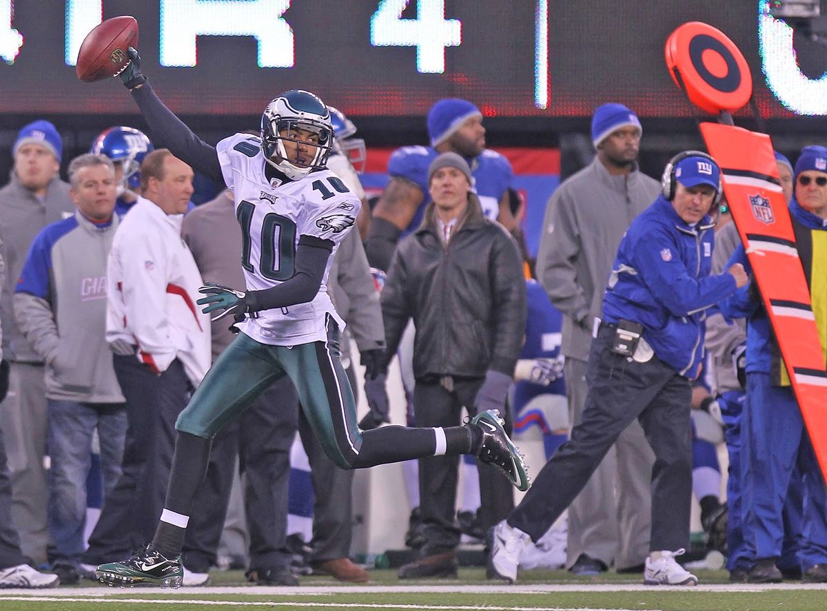 DeSean Jackson heads to end zone, much to. the dismay of Giants head coach Tom Coughlin.
