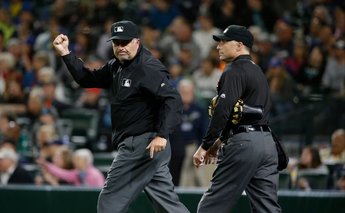 Dale Scott, left, with Dan Iassogna, who’s been on Scott’s crew for more than a decade. Ted S. Warren/AP Photo.