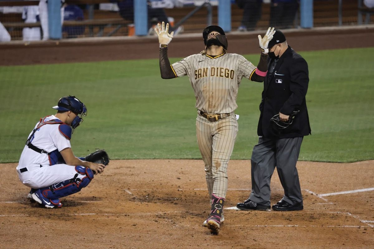 Fernando Tat ís Jr. hit two home runs against the Dodggers on the aiversary of his father hitting two grand slams in one inning.