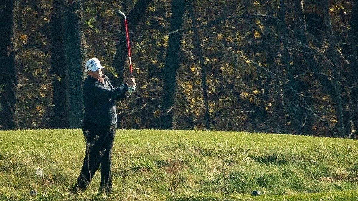 U.S. President Donald Trump golfs at Trump National Golf Club, on November 7, 2020 in Sterling, Virginia.