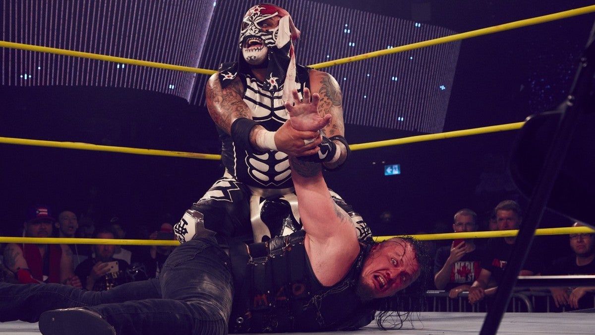 Pentagon Jr. gets ready to break Sami Callihan’s arm.