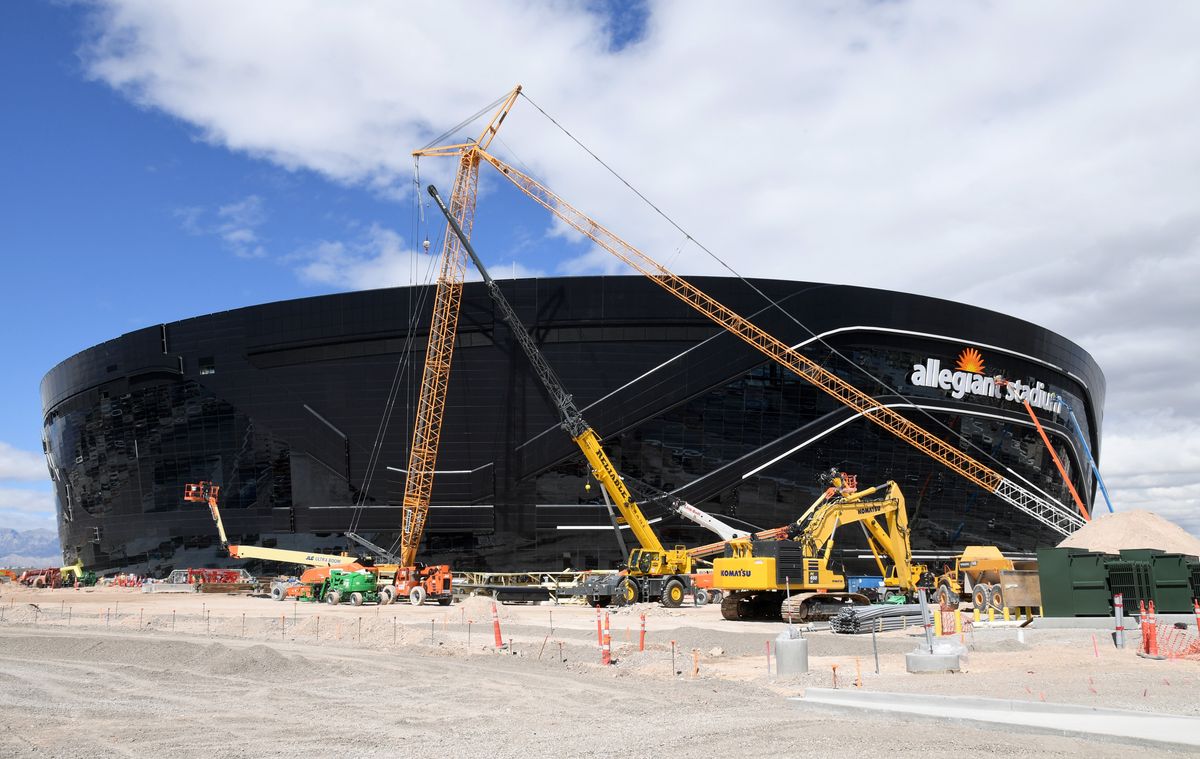 Despite a worker at the site testing positive for coronavirus, construction at the Raiders new stadium is being allowed to continue.