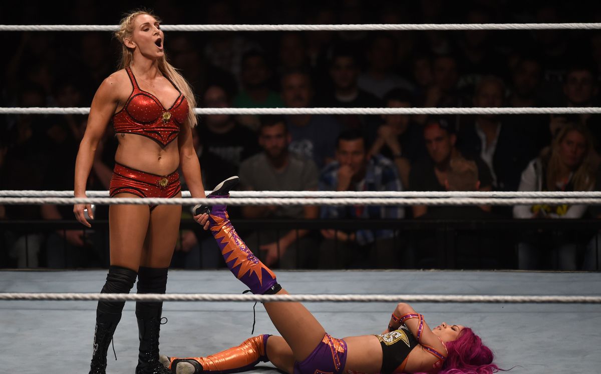 WWE wrestling stars like  Charlotte Fair (left( and Sasha Banks have c hanged women’s wrestling.