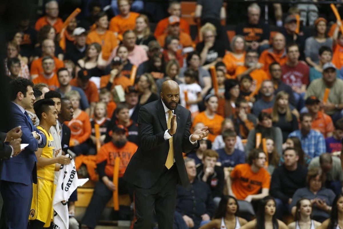 Cal assistant coach Yann Hufnagel, on the far left, watches the Golden Bears play Oregon State on Jan. 6. Via  [object Object] .
