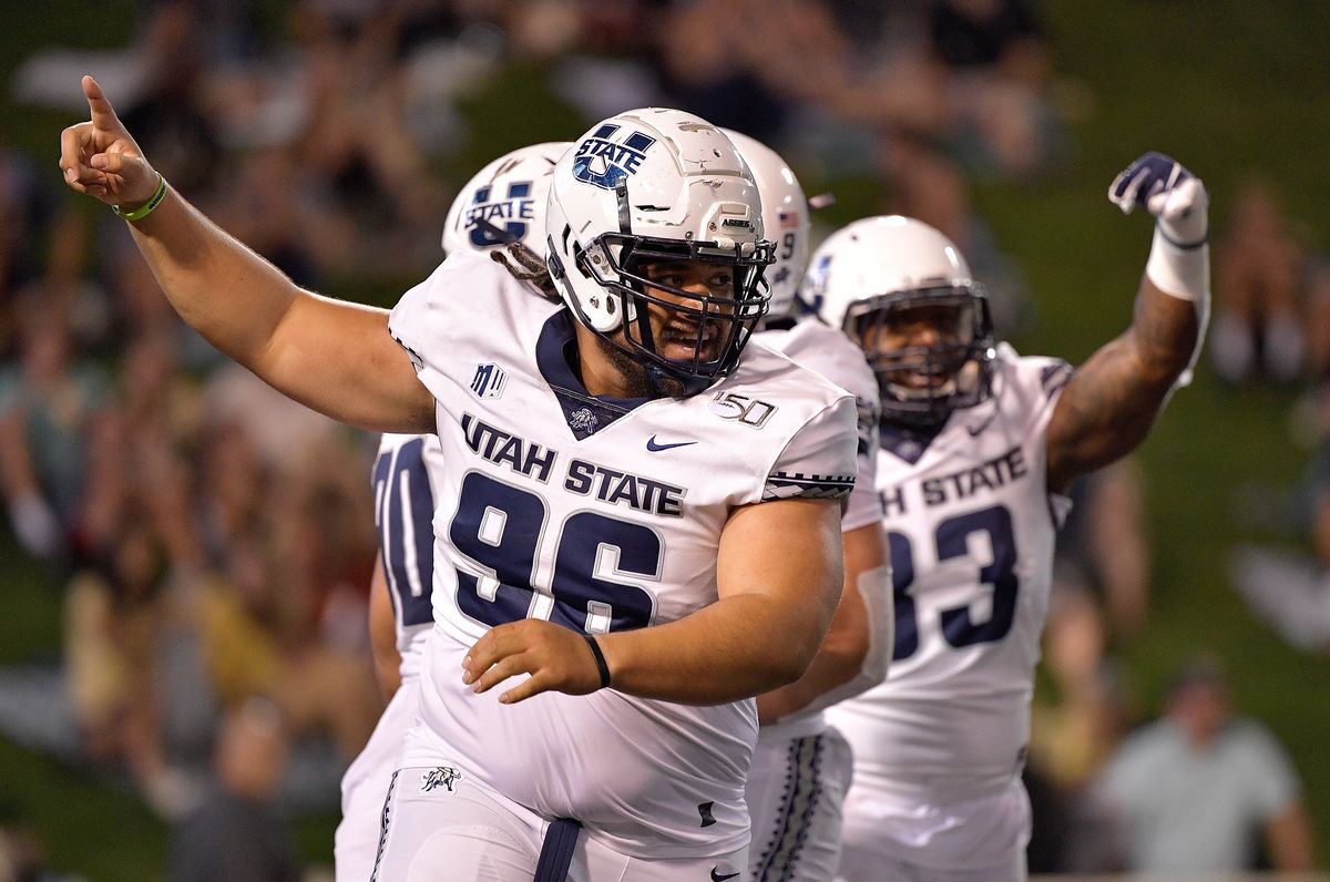 The Utah State Aggies refused to play this week’s game to support their coach.