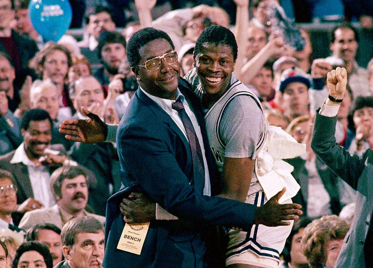 John Thompson with his first superstar, Patrick Ewing, after winning the 1984 national championship.