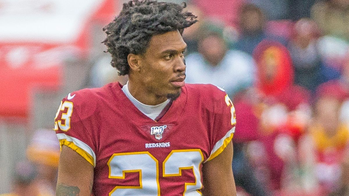 Quinton Dunbar, currently wanted on four felony counts stemming from an alleged armed robbery Wednesday night, played no part in the incident, his lawyer said Friday.