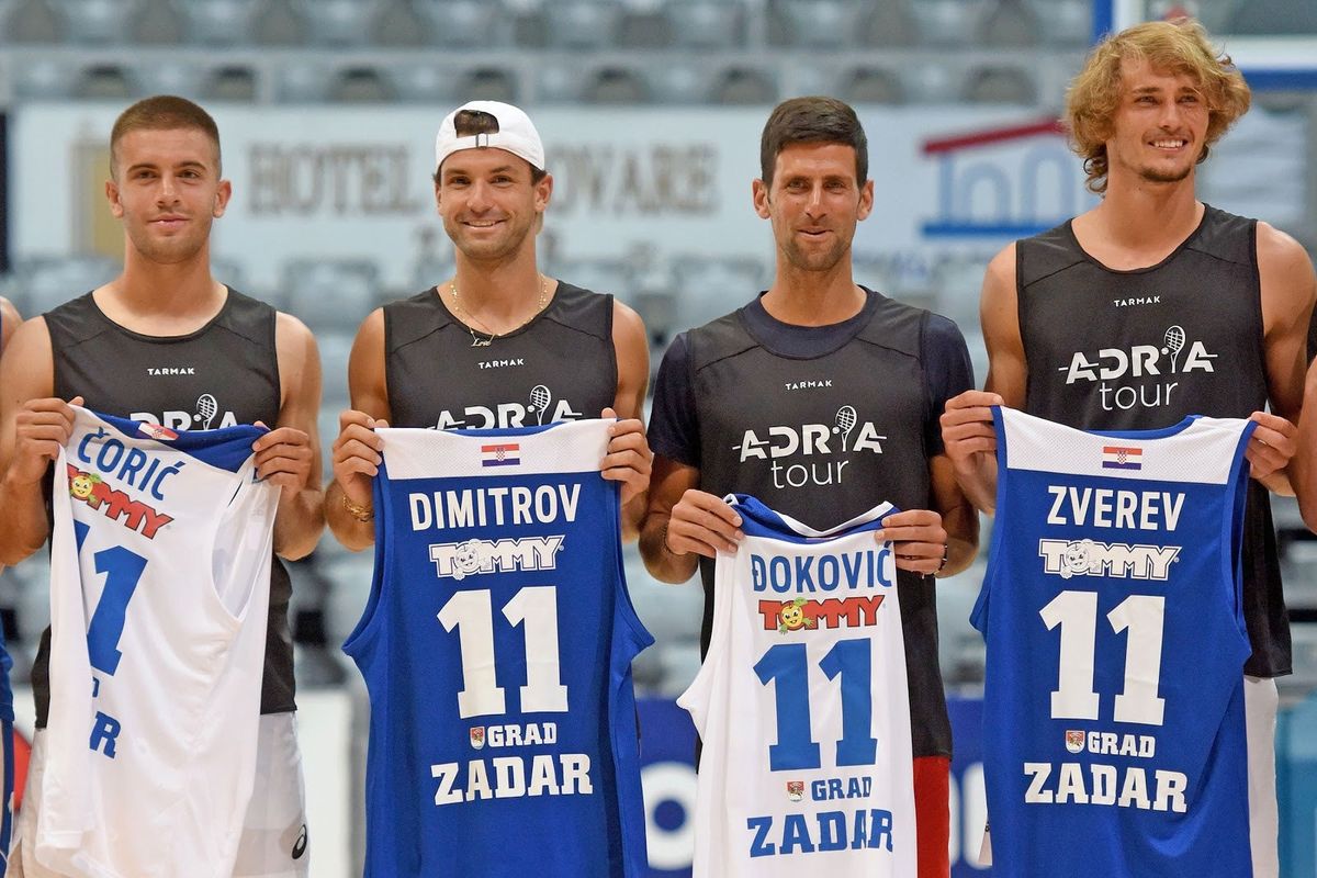(L/R):Croatia’s Borna Coric, Bulgaria’s Grigor Dimitrov, Serbia’s Novak Djokovic, and Germany’s Alexander Zverev, pose for a group photograph ahead of an exhibition basketball match in Zadar. Image: Getty