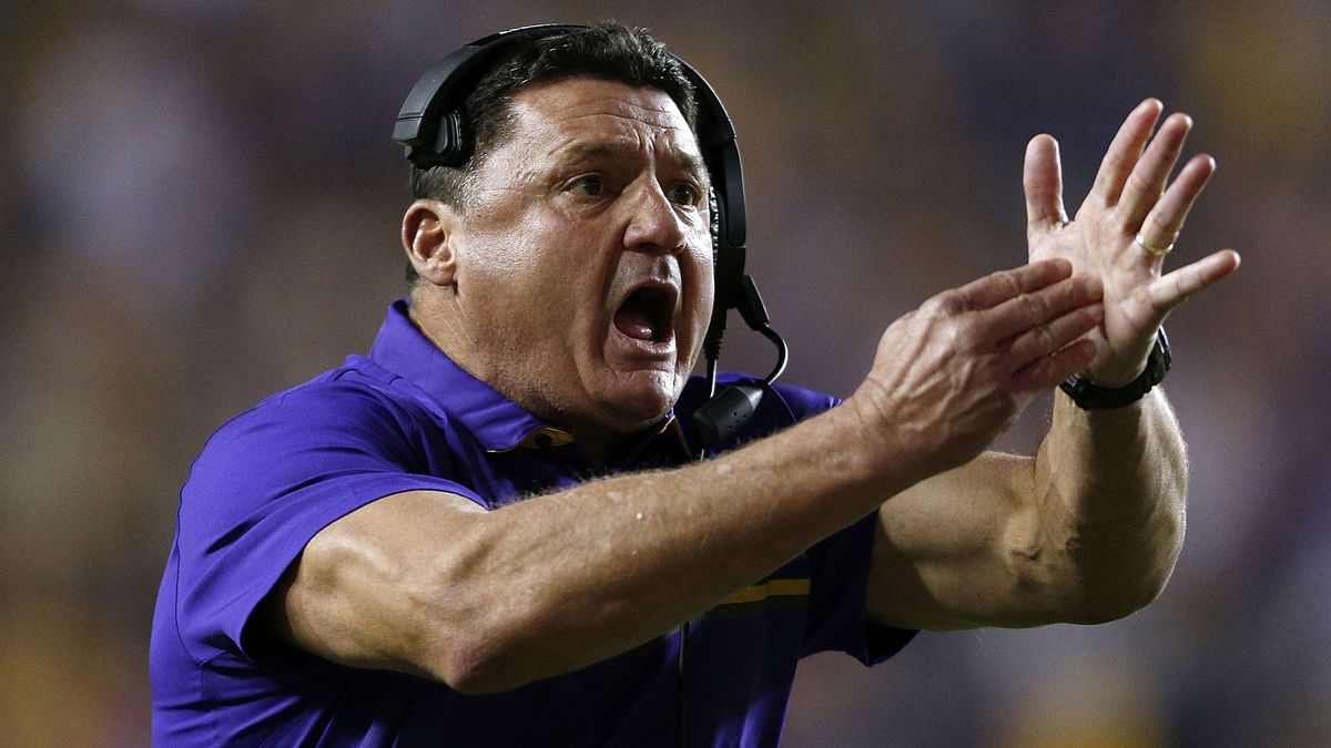 Ed Orgeron, likely calling for a caffeine timeout. Photo: Jonathan Bachman/ [object Object]
