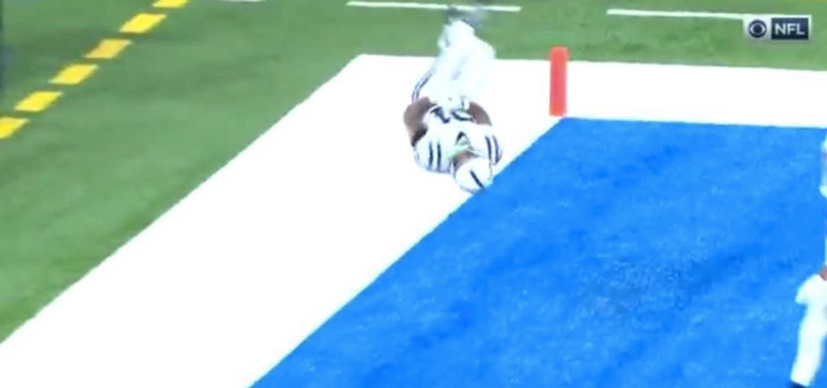Nyheim Hines with the TC and the back flip with a full twist.