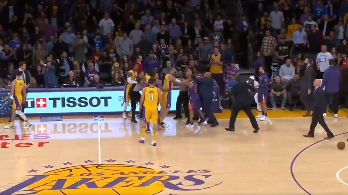 Lonzo Ball rushing to head coach Luke Walton’s aid. Image via YouTube