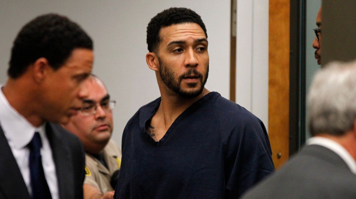 Kellen Winslow Jr., center, leaves his arraignment Friday.