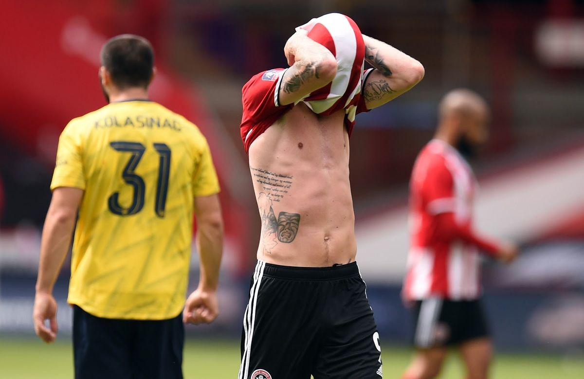 Sheffield United’s striker Oliver McBurnie is wondering what the hell happened as his team lost to Arsenal in FA Cup action on June 28.