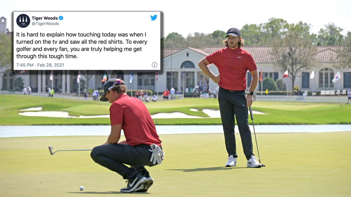 Tommy Fleetwood (r.) and Cameron Champ wear red on Sunday for Tiger Woods.