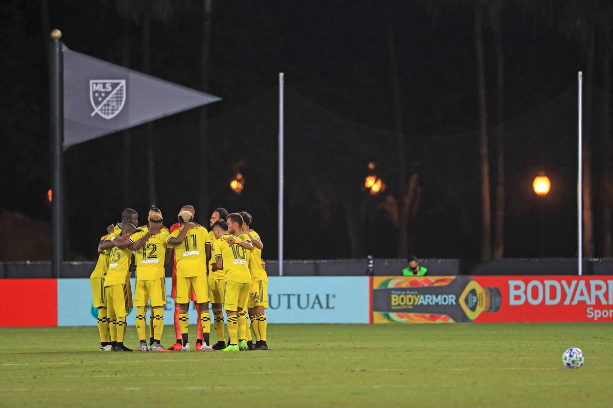 Members of the Columbus Crew huddle up prior to the match against the FC Cincinnati in the MLS Is Back Tournament.