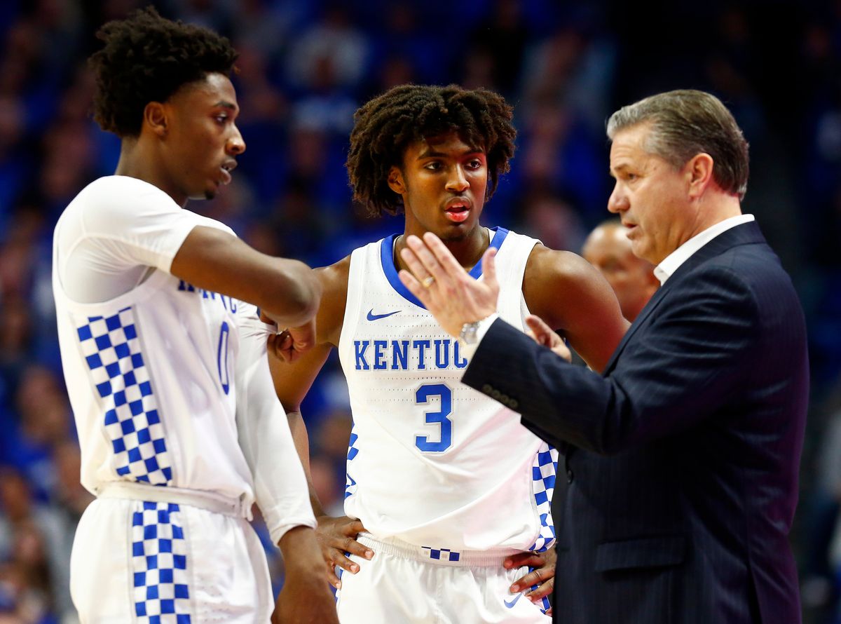 Kentucky’s Ashton Hagans, left, and Tyrese Maxey, center, have already declared for the NBA draft.