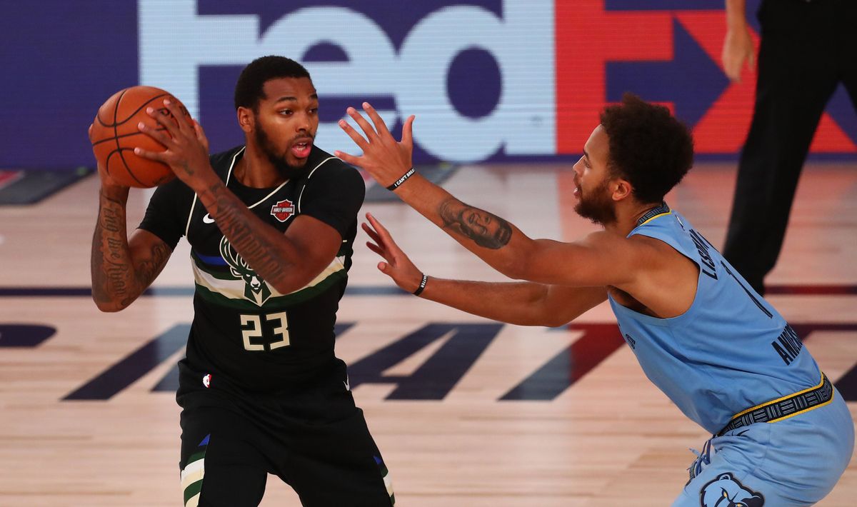 Police in Milwaukee pinned Sterling Brown (l.) against parking lot asphalt and hit him with a stun gun.