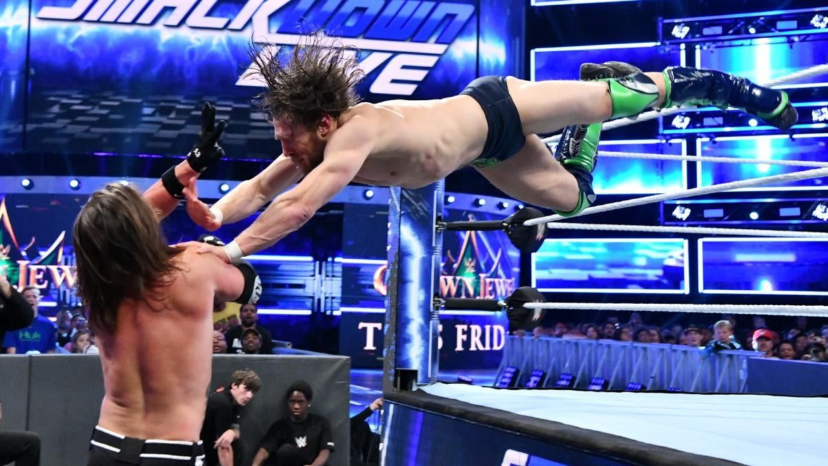 Daniel Bryan dives onto A.J. Styles in their match at Tuesday’s SmackDown taping in Atlanta, which was moved from this Friday’s Crown Jewel event in Saudi Arabia.
