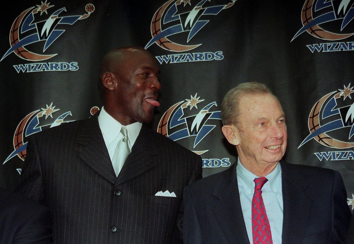 Michael Jordan with Abe Pollin after he signed with the Wizards in 2000. Getty